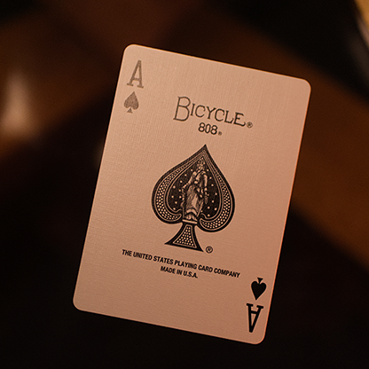 Ace of Spades playing card with Bicycle logo on a dark background from Bicycle Metallic Ruby Playing Cards