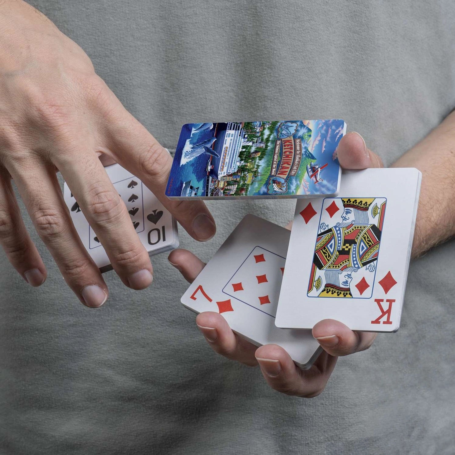 Close-up of Boardwalk Ketchikan card back and traditional playing-card faces