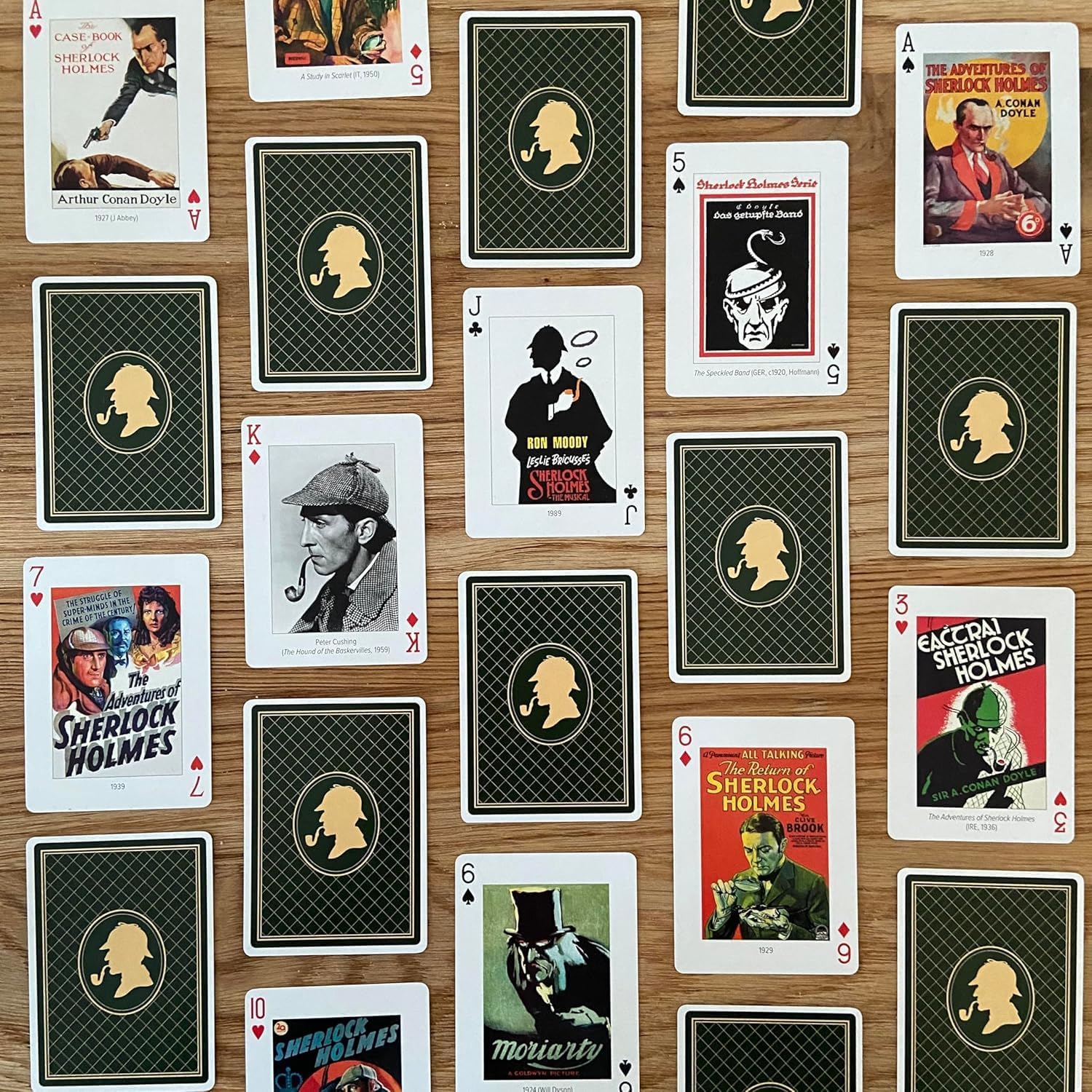 Sherlock Holmes collector playing cards by Piatnik spread across table