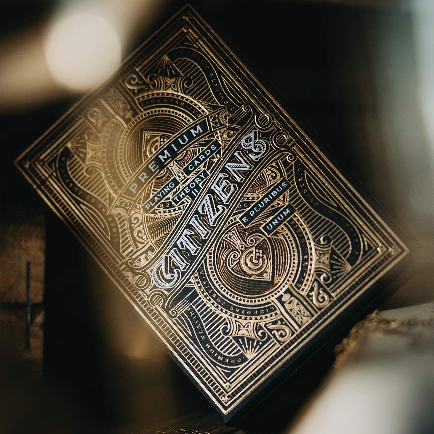 Citizens premium playing cards with intricate design on a dark background