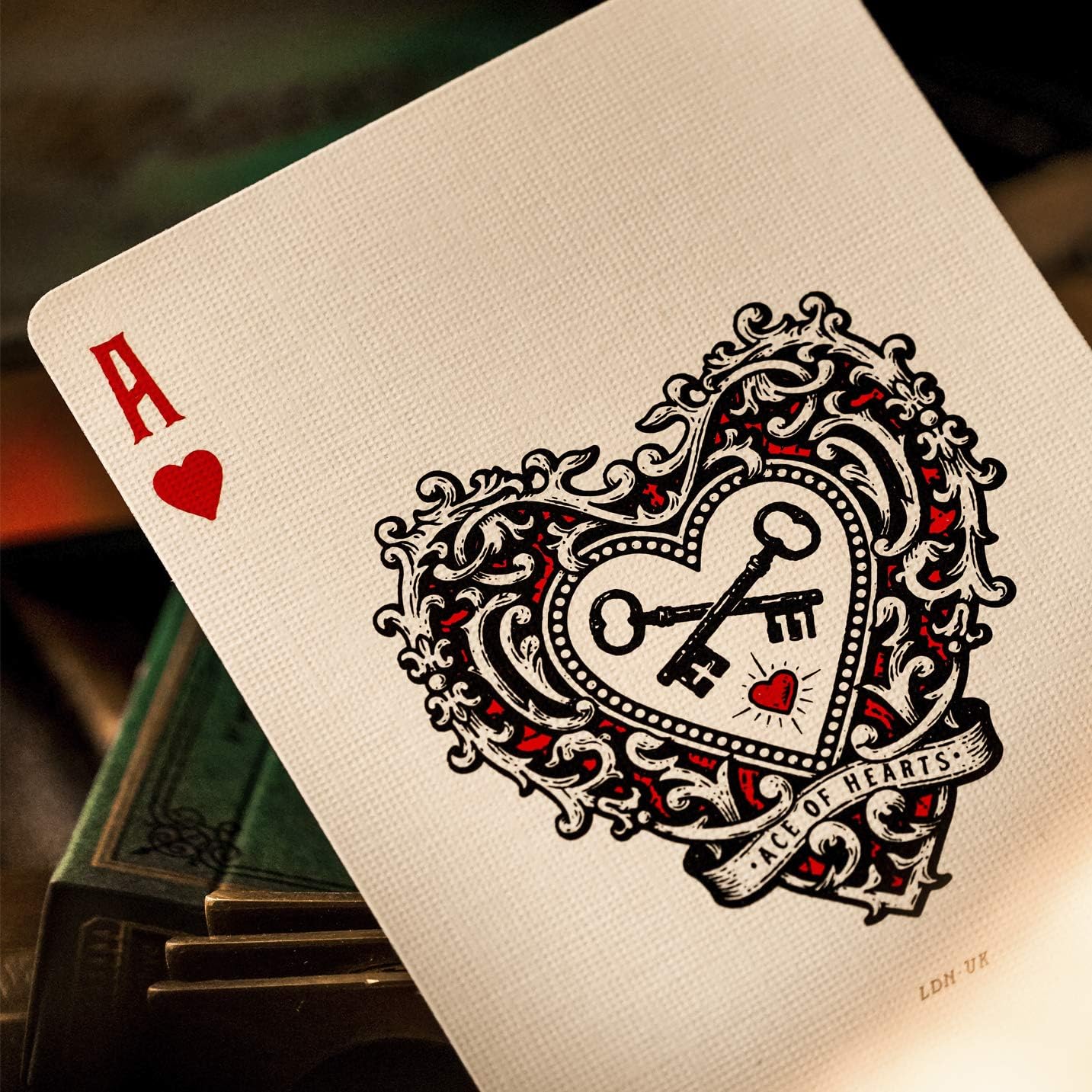 Ace of hearts from Derren Brown deck with ornate heart frame, crossed keys, and small red heart.