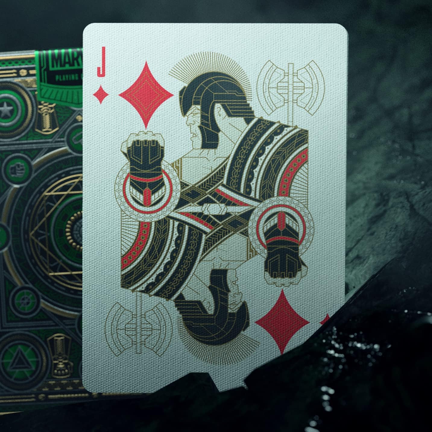 Playing card with a detailed design on a dark background