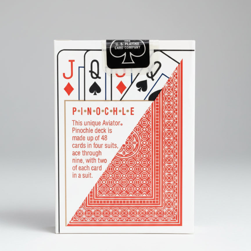 Playing card with Pinochle deck information and U.S. Playing Card Company logo.