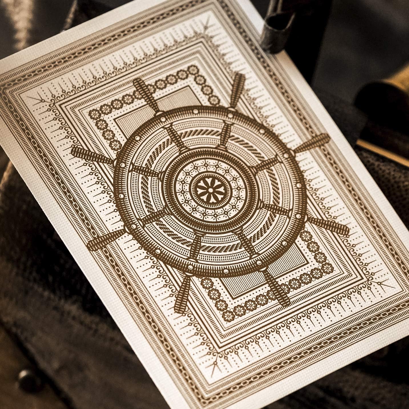 Theory11 Navigators embossed tuck box and ornate gold ship wheel design