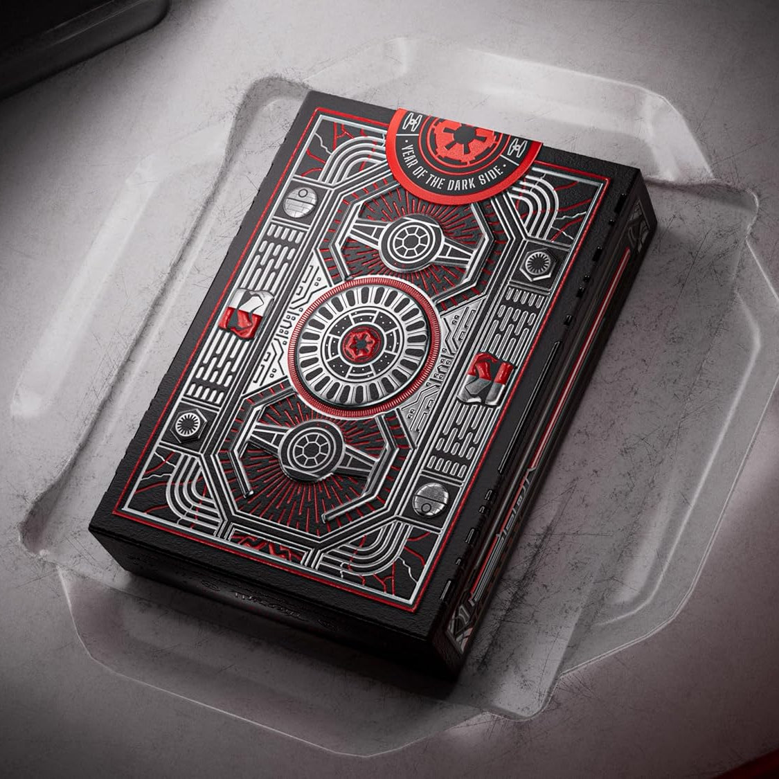 Playing card deck with intricate design on a reflective surface