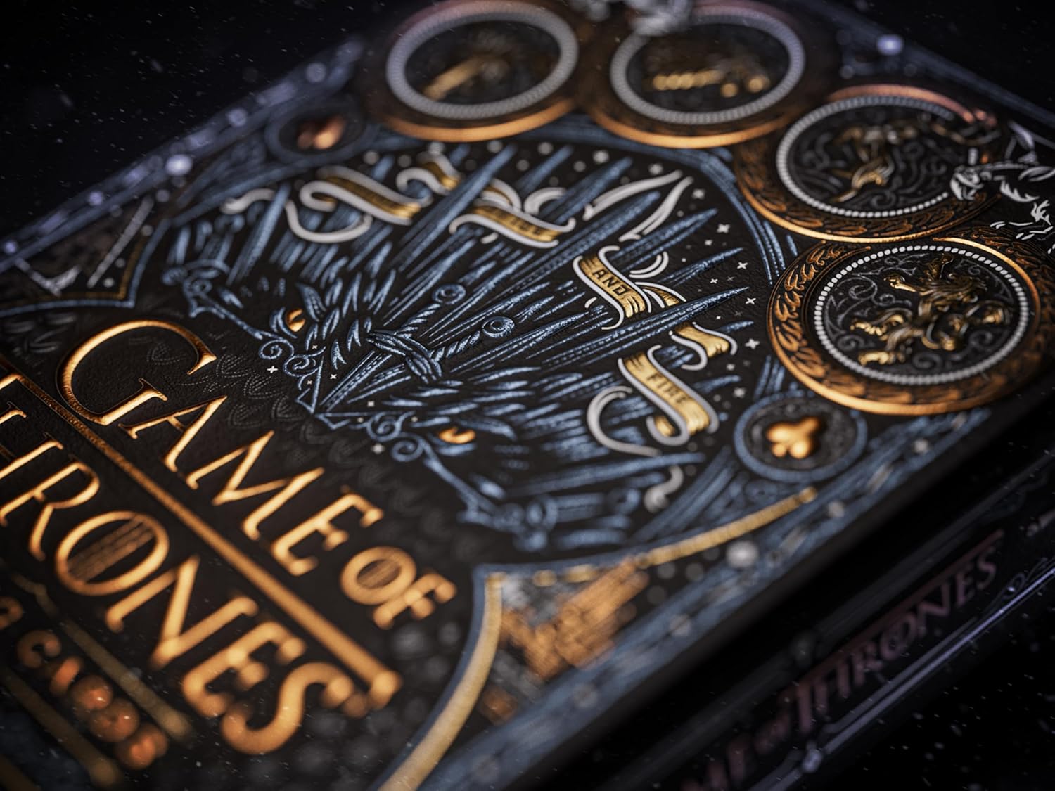 Close-up of Theory11 Game of Thrones tuck showing Iron Throne artwork and foil detail