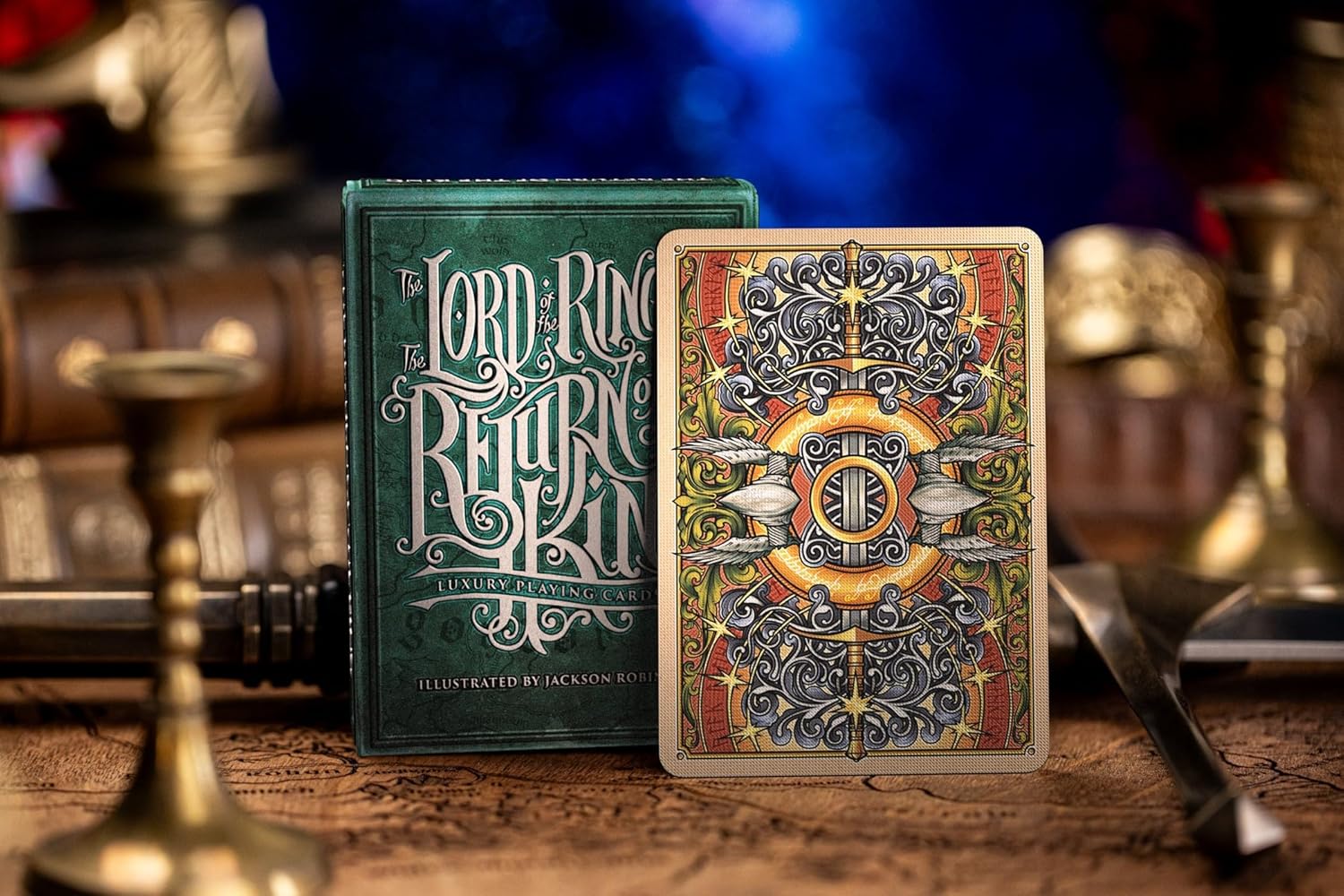 Return of the King deck displayed on map of Middle‑earth with brass candlesticks and sword in the background.