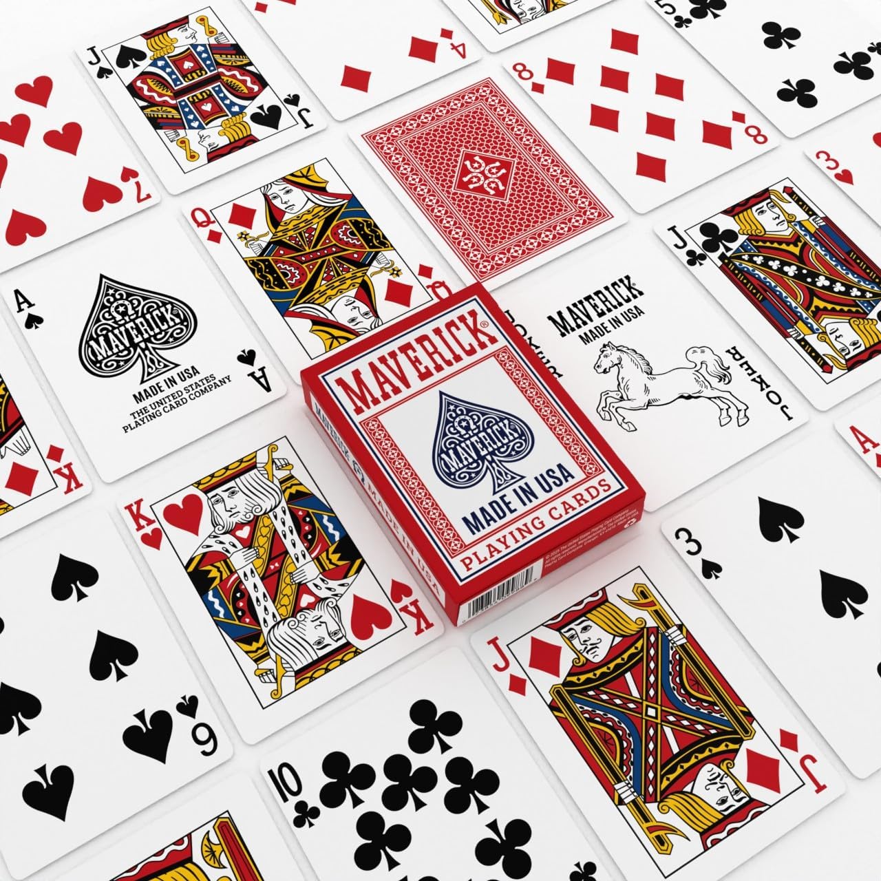 Maverick playing cards with various card suits displayed around a box of Maverick playing cards.