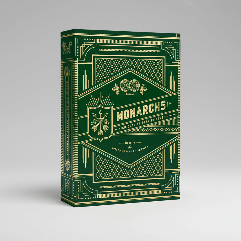Green and gold box of Monarchs playing cards with intricate designs.