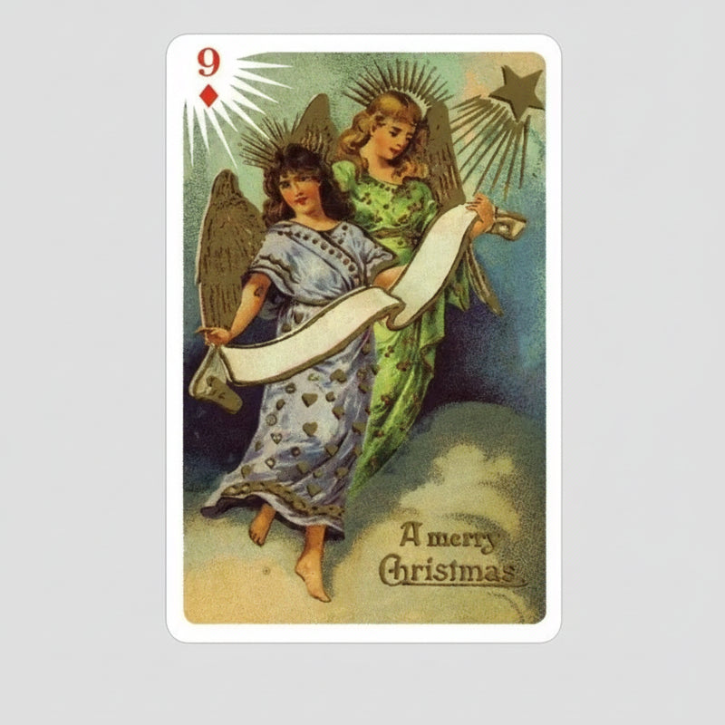 Playing card with two angelic figures holding a banner, labeled 'A merry Christmas'.