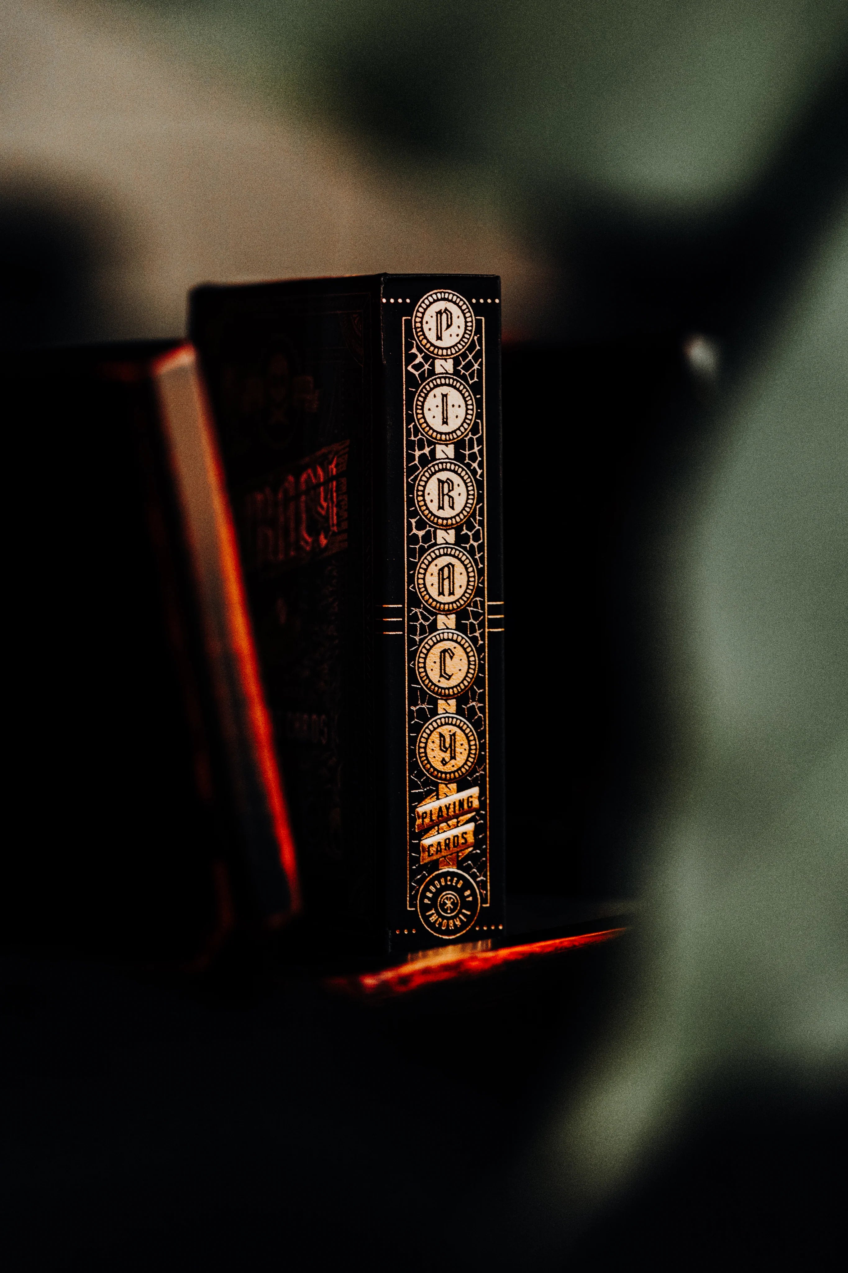 Decorative Piracy deck with ornate cover design on a dark background