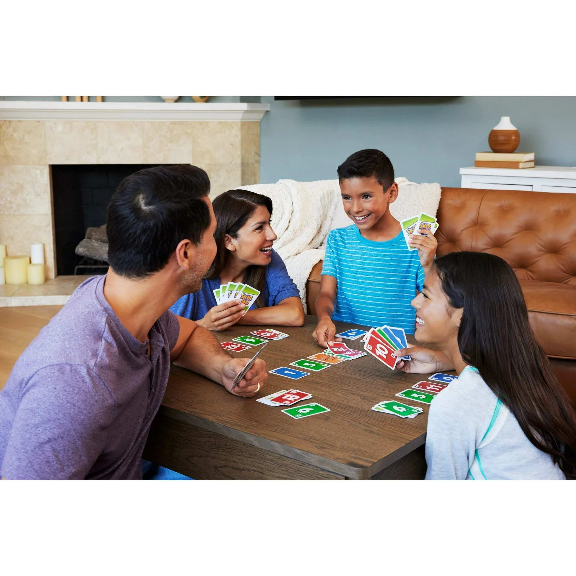 Family playing Skip Bo together in a living room