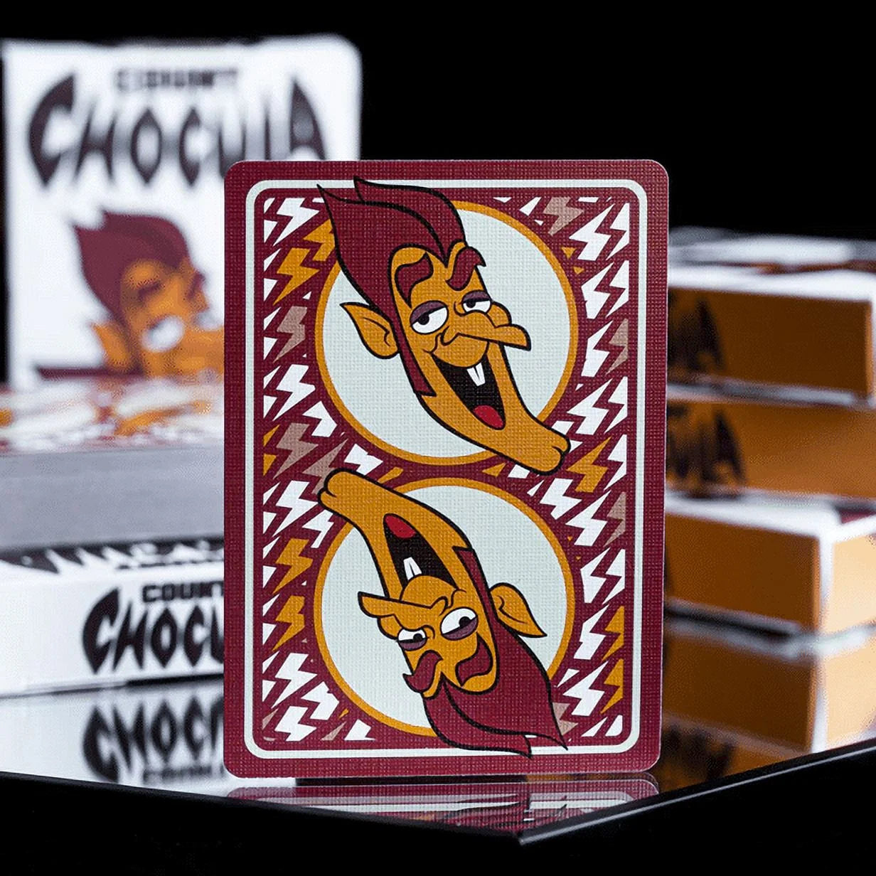 Playing card with Count Chocula design on a black background