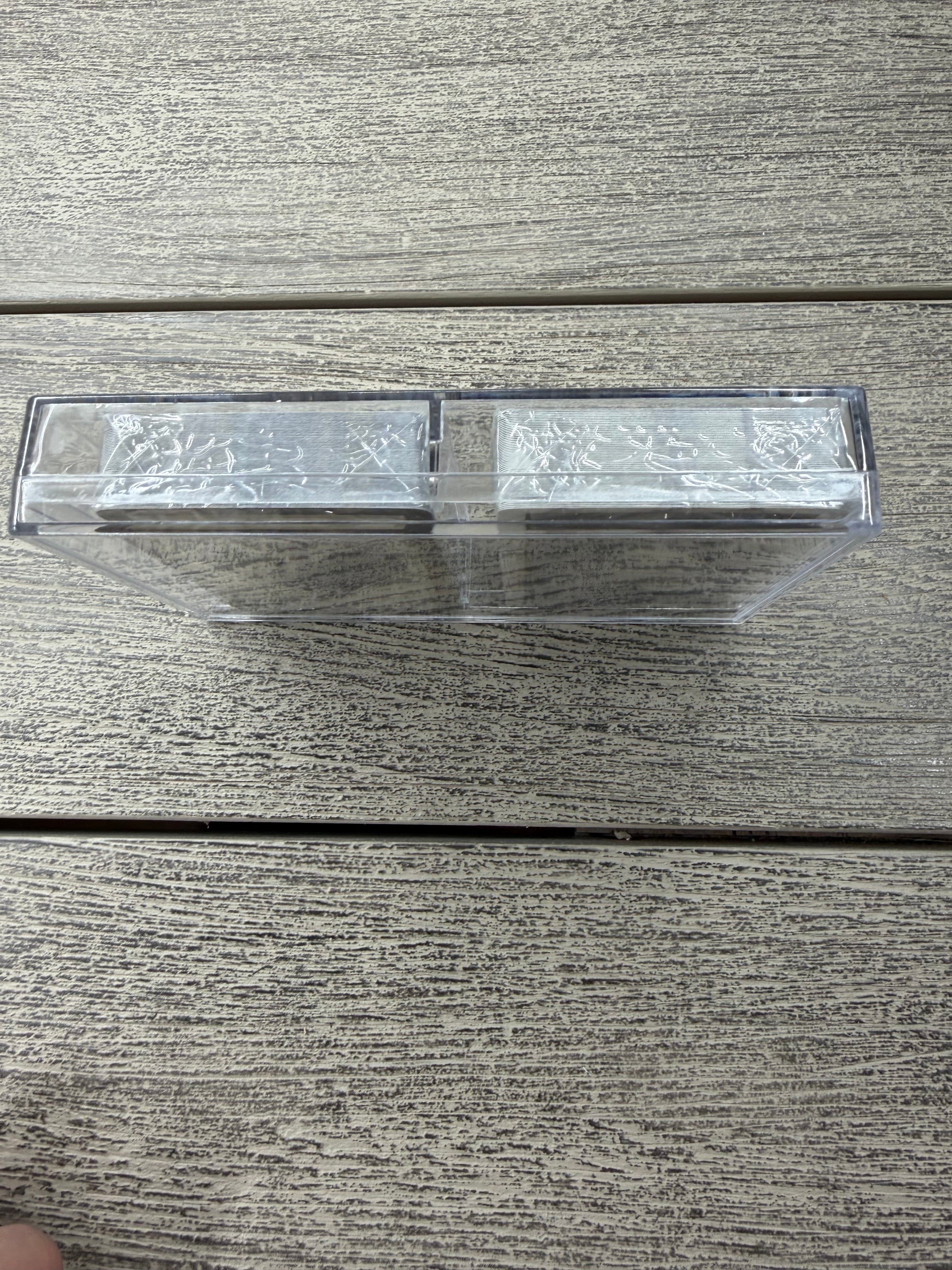 Close-up of a textured wall with a rectangular light fixture.