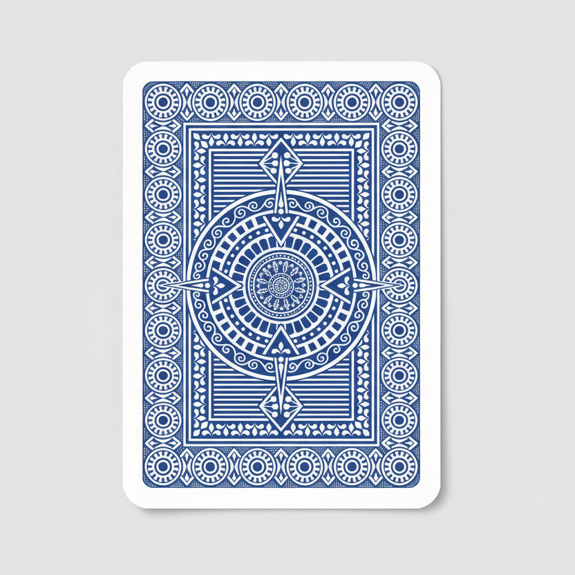 Blue playing card with intricate design on a white background
