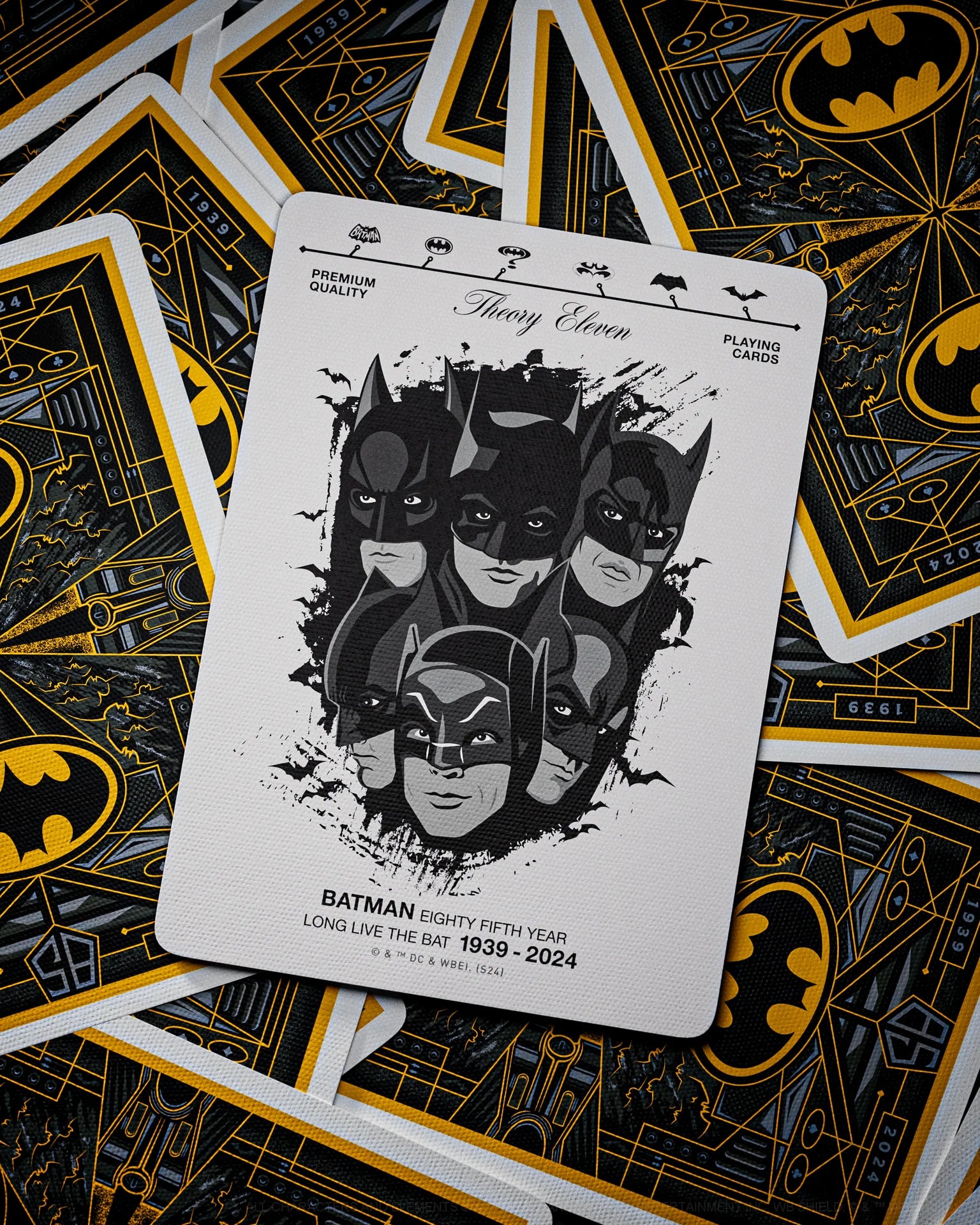 Playing cards with Batman design on a black background
