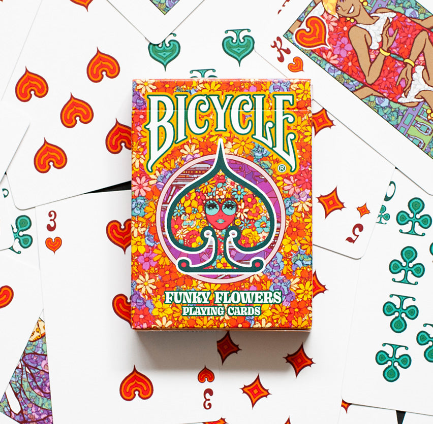 Bicycle Funky Flower Playing Cards tuck box displayed on top of cards with custom suit symbols