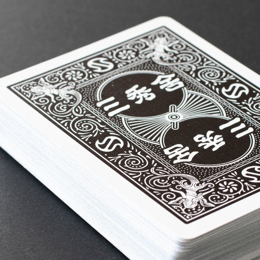 Bicycle Sanshusha Playing Cards Black close-up of custom black back design on deck
