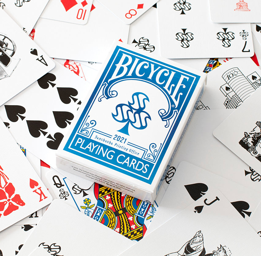 Bicycle Sanshusha Playing Cards Blue with tuck box, custom extra cards, and face cards spread out
