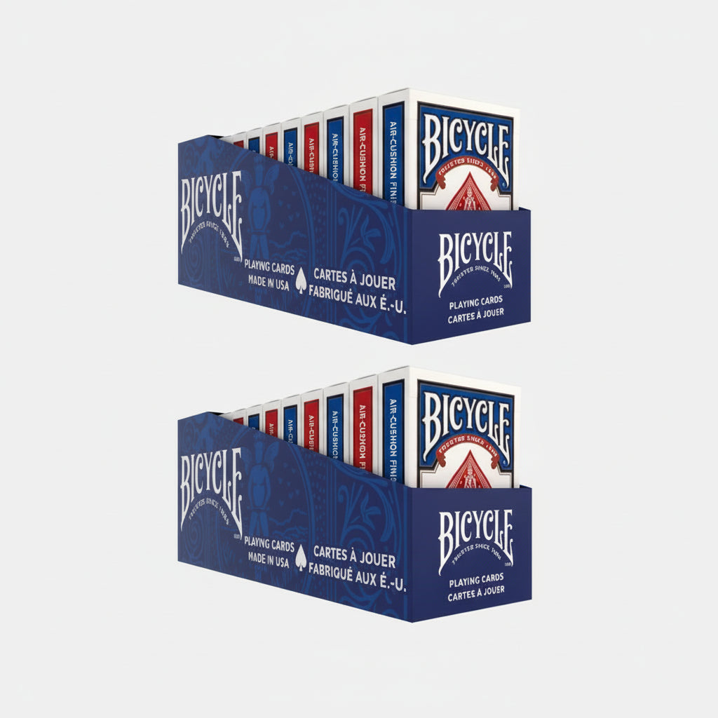 Two bricks of Bicycle standard playing cards on a white background