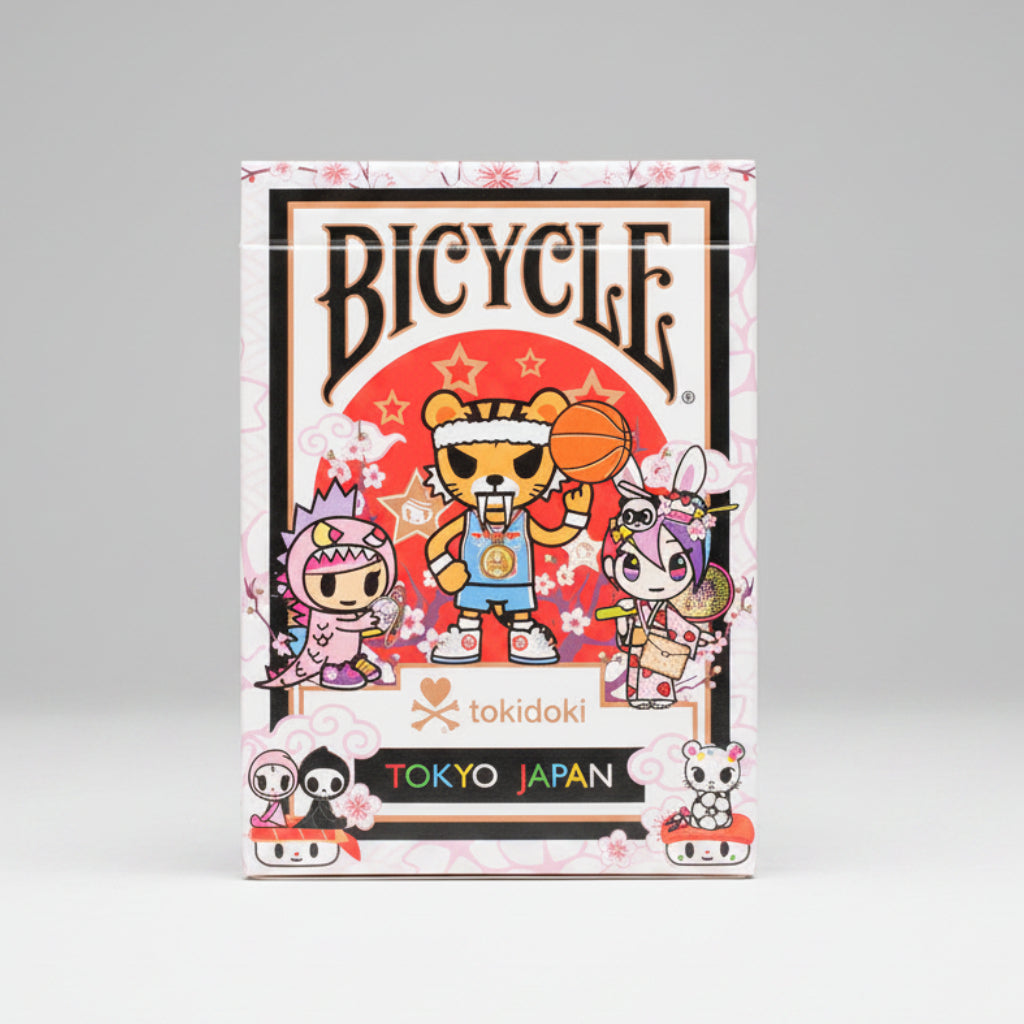 Front of Bicycle tokidoki Sports Black Playing Cards tuck box with tokidoki characters, cherry blossoms, and Tokyo Japan theme