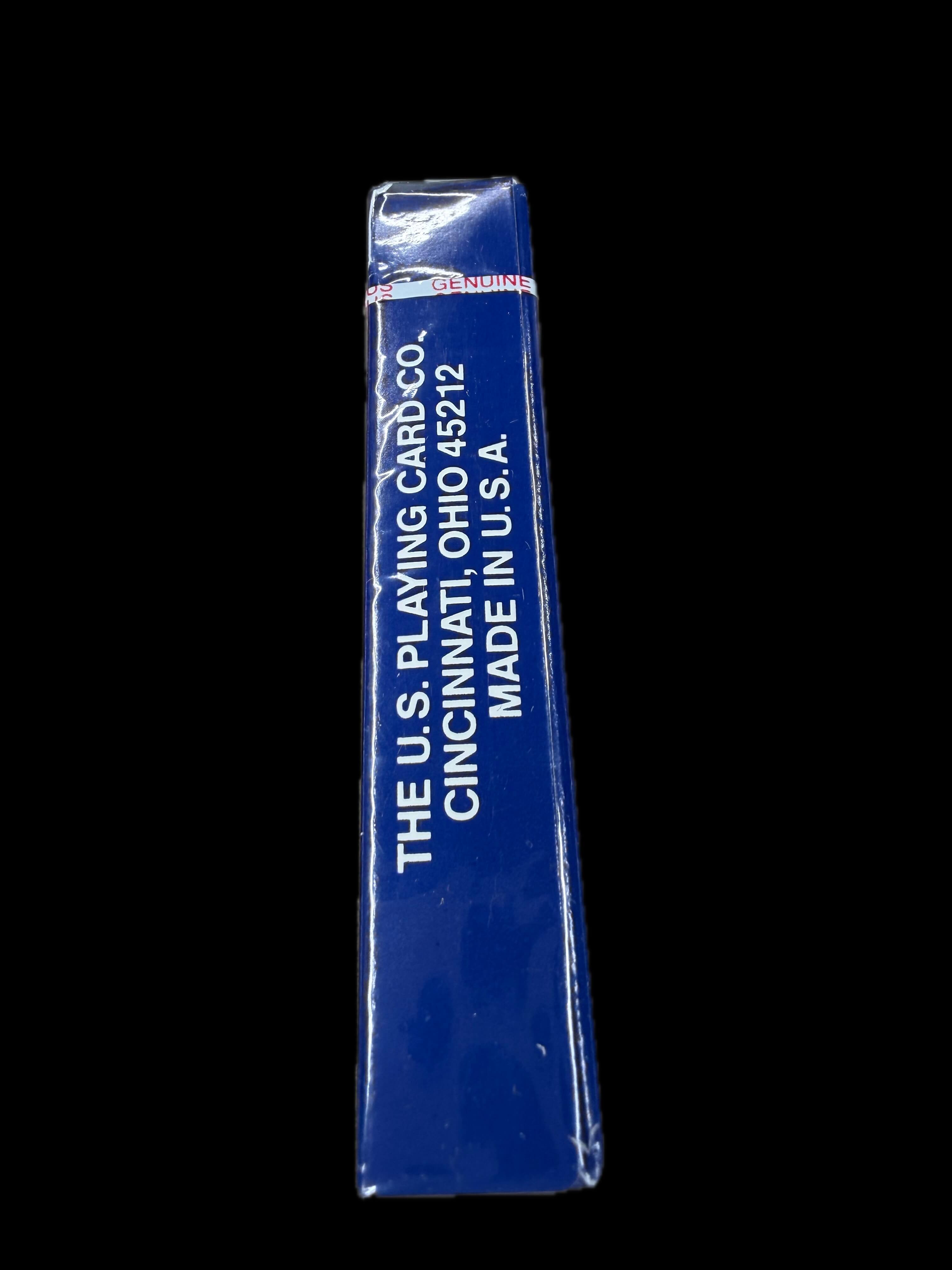 Blue packaging of The U.S. Playing Card Co. with text on a black background