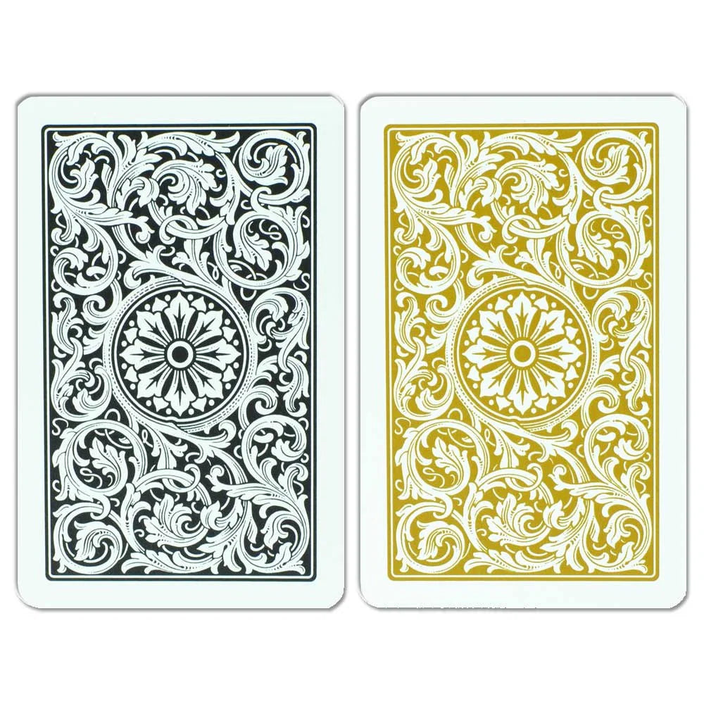 Two Copag 1546 Bridge Size Regular Index (Black & Gold) playing cards with intricate floral patterns on a white background