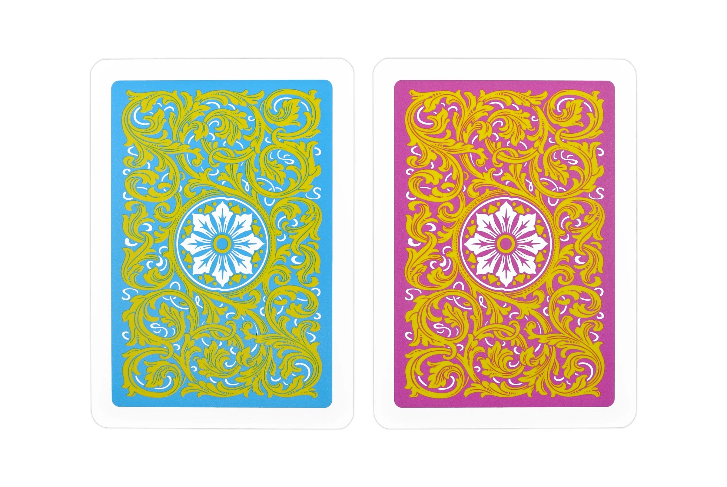 Two Copag Neoteric Poker Size Regular Index (Pink & Yellow) playing cards with decorative patterns on a white background