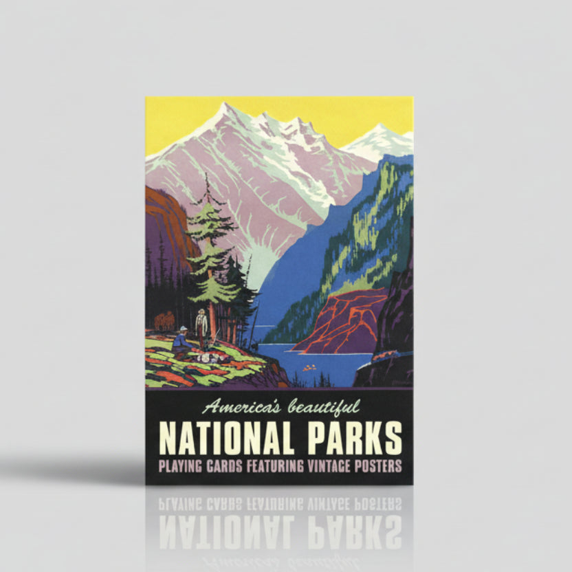 Playing card box with a scenic illustration of mountains and a lake, featuring text about National Parks.