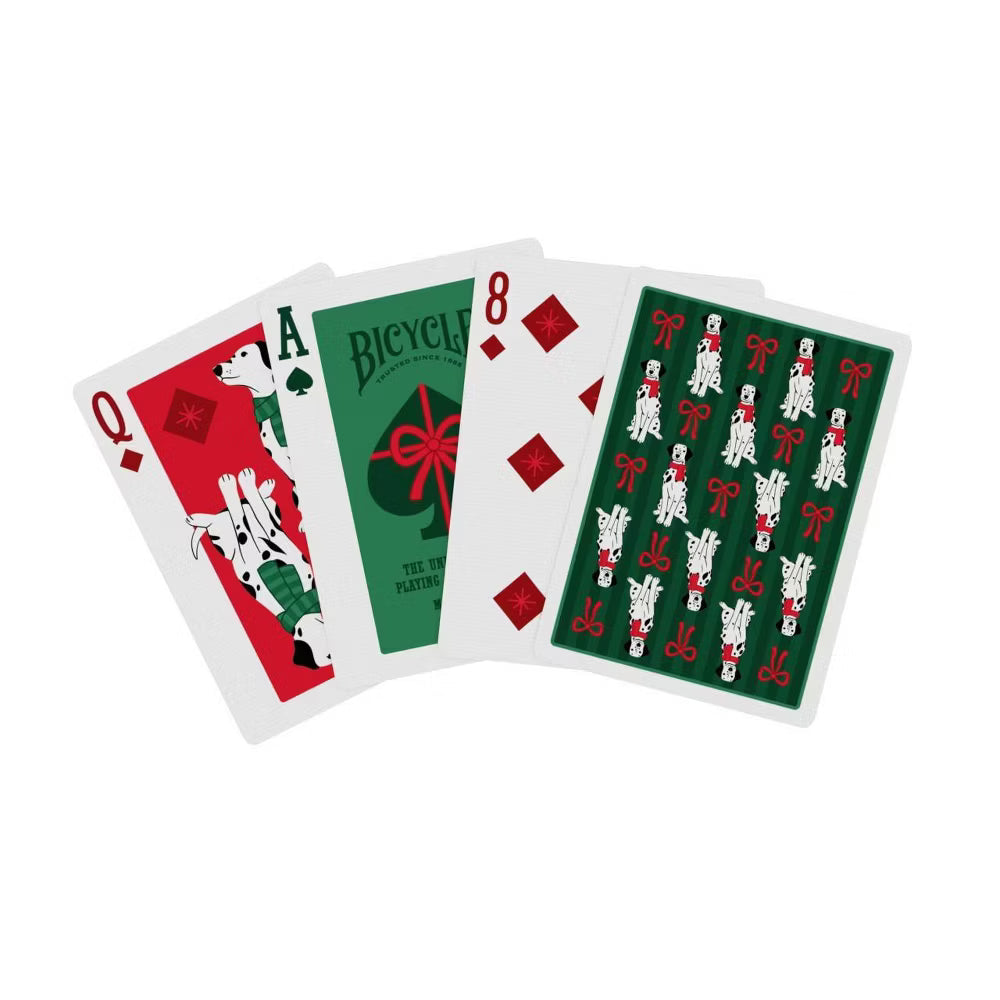 Four playing cards with festive design on a white background