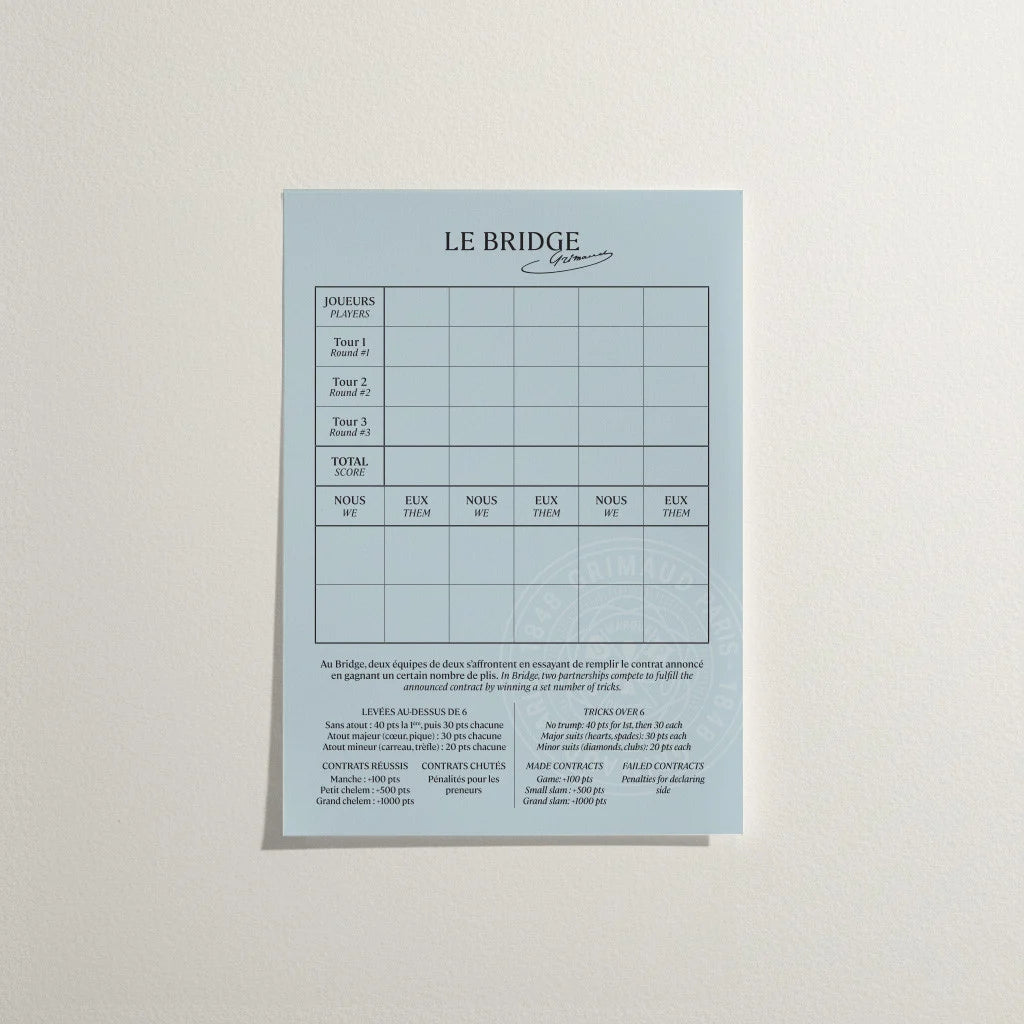 Light blue paper with 'Le Bridge' branding and text on a gray background