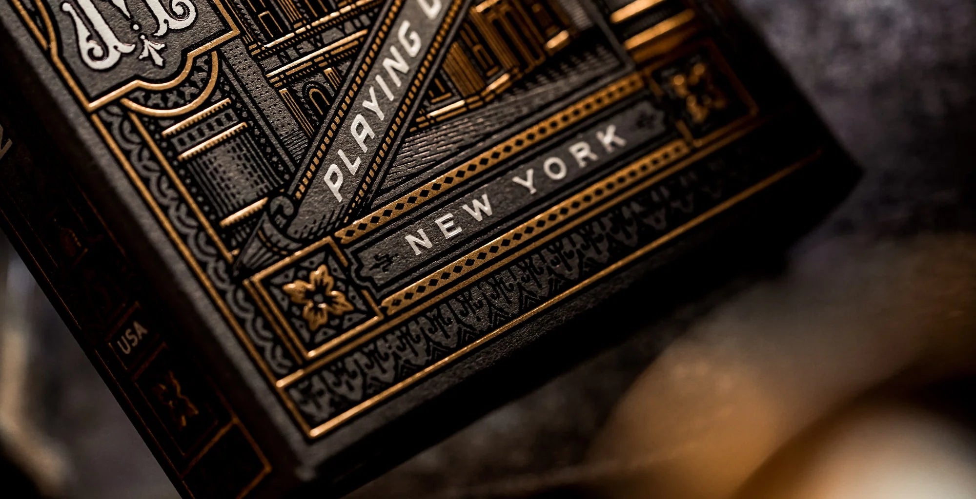Close-up of the Theory11 Black Hudson tuck lower front with New York banner