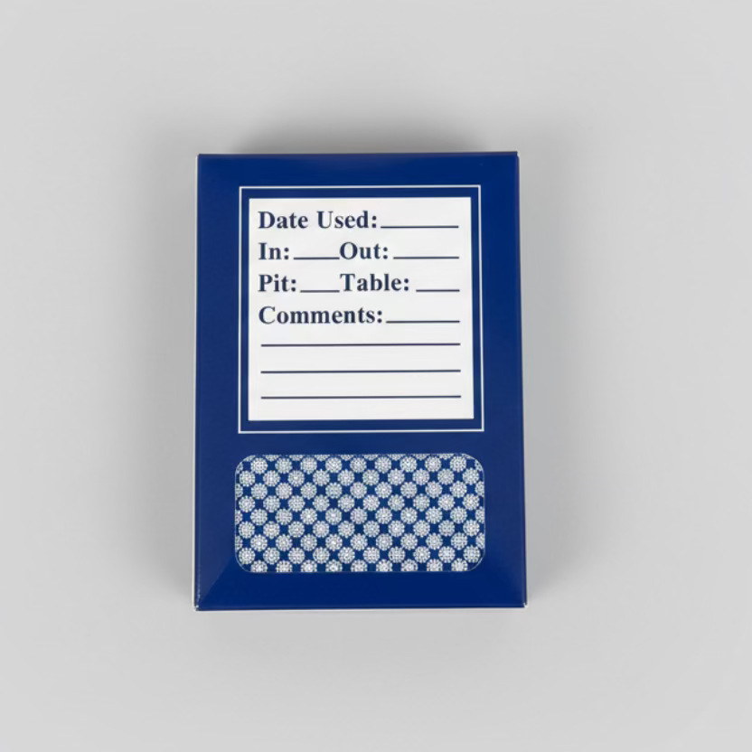 Blue Gemaco Traditional Series tuck box back with text on a wooden surface