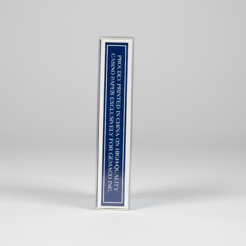 Small rectangular label with text on a wooden surface