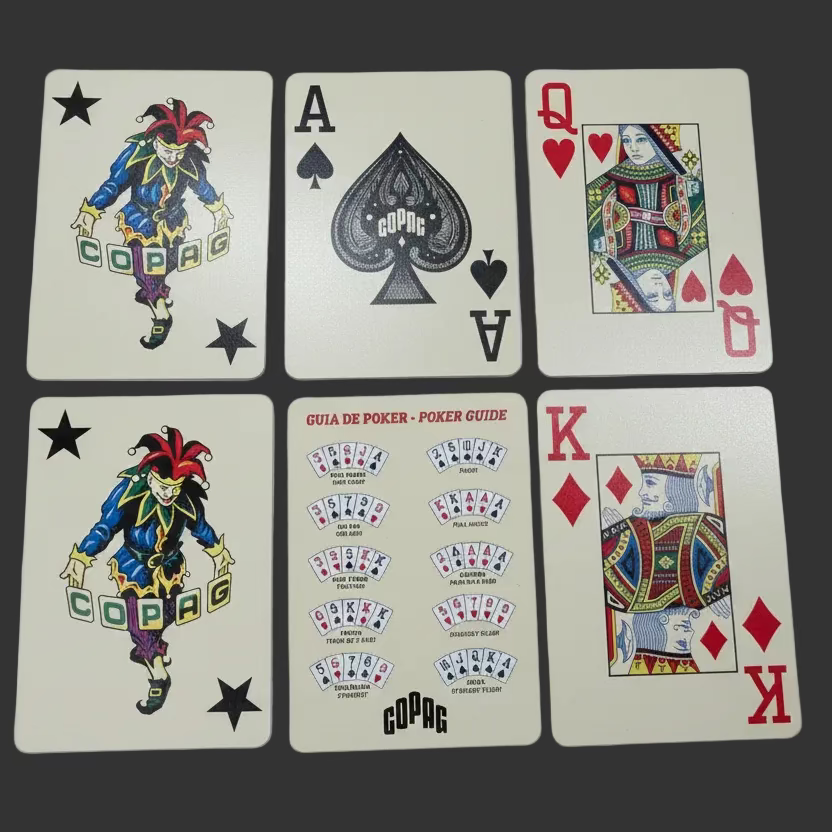 Six cards from the Copag Vintage Collection on a dark surface, including two custom jokers, a custom Ace of Spades, Queen of Hearts, King of Diamonds, and poker guide card.