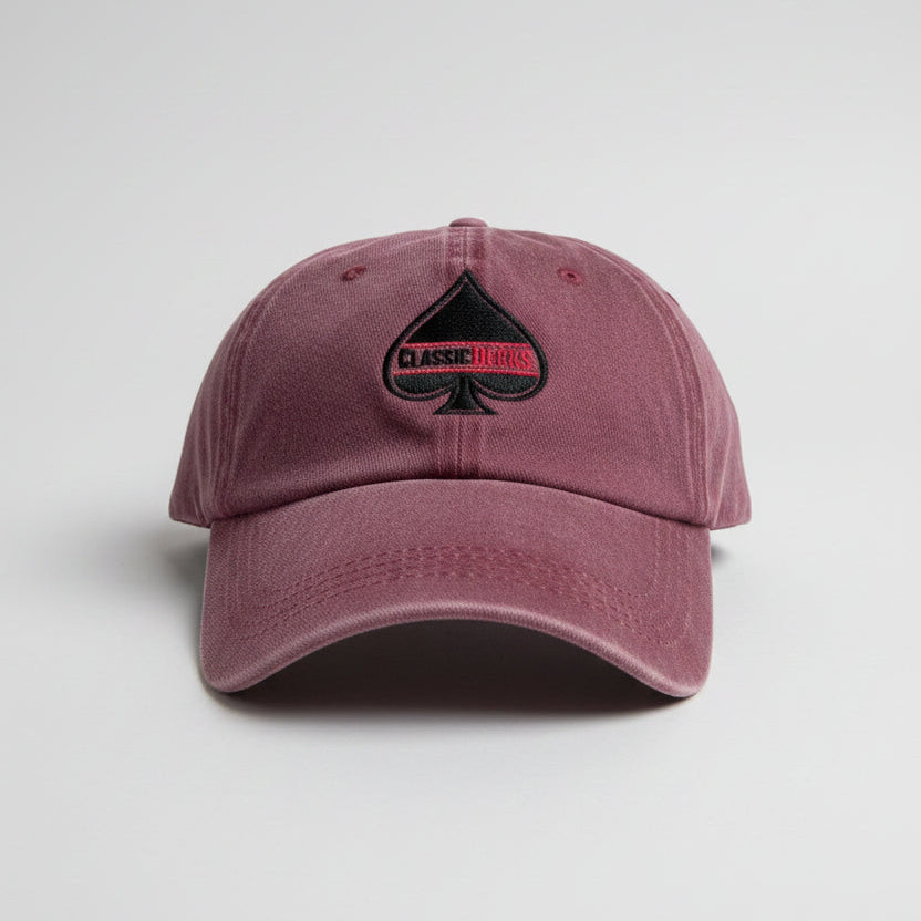 Red wine cap with a black and red ClassicDecks logo 