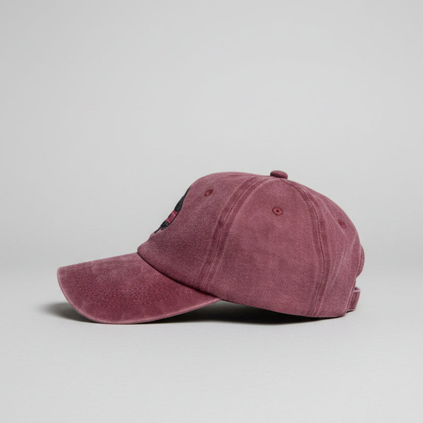 Red white baseball cap on a light gray background