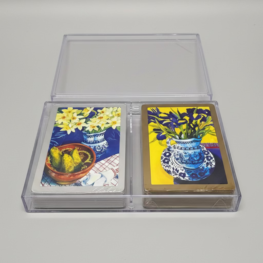 Congress Fleur de Lis Playing Cards in an open case on green felt 