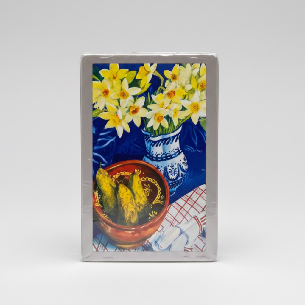 Congress Fleur de Lis Playing Cards in an open case on green felt 