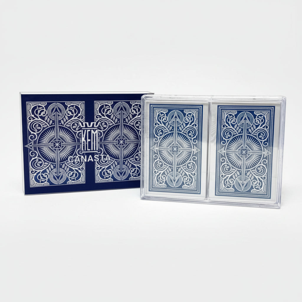 Blue and white playing cards with intricate designs on a white background