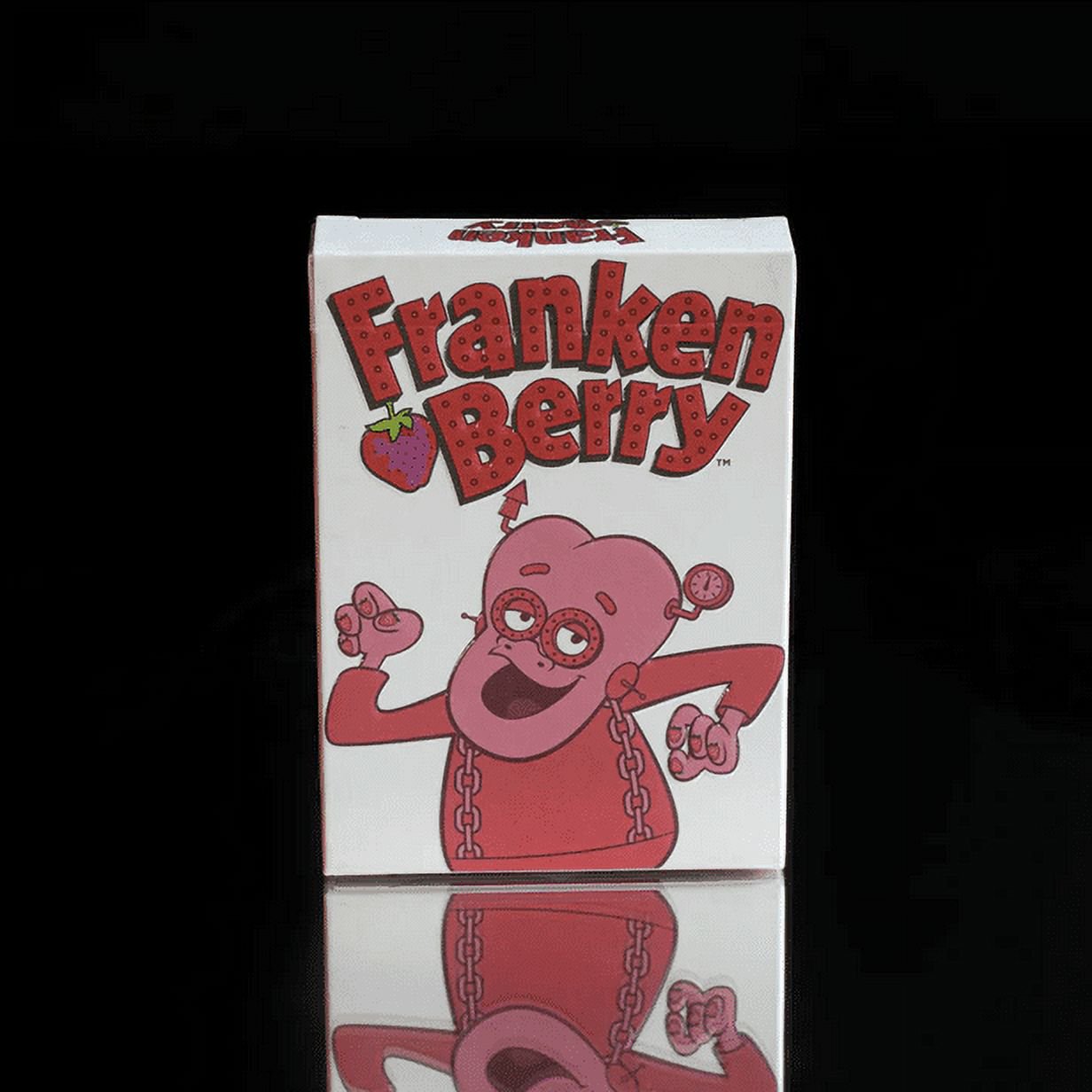 Cartoon character packaging for 'Franken Berry' playing cards on a white background
