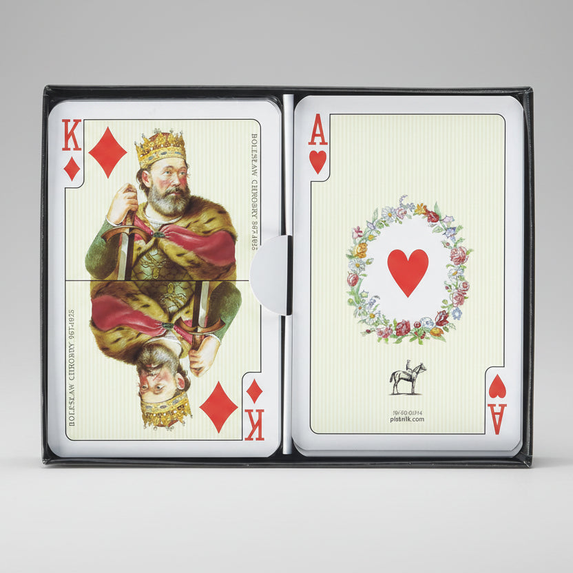 Open Piatnik Polonia set displaying king of diamonds portrait and floral heart ace card faces.