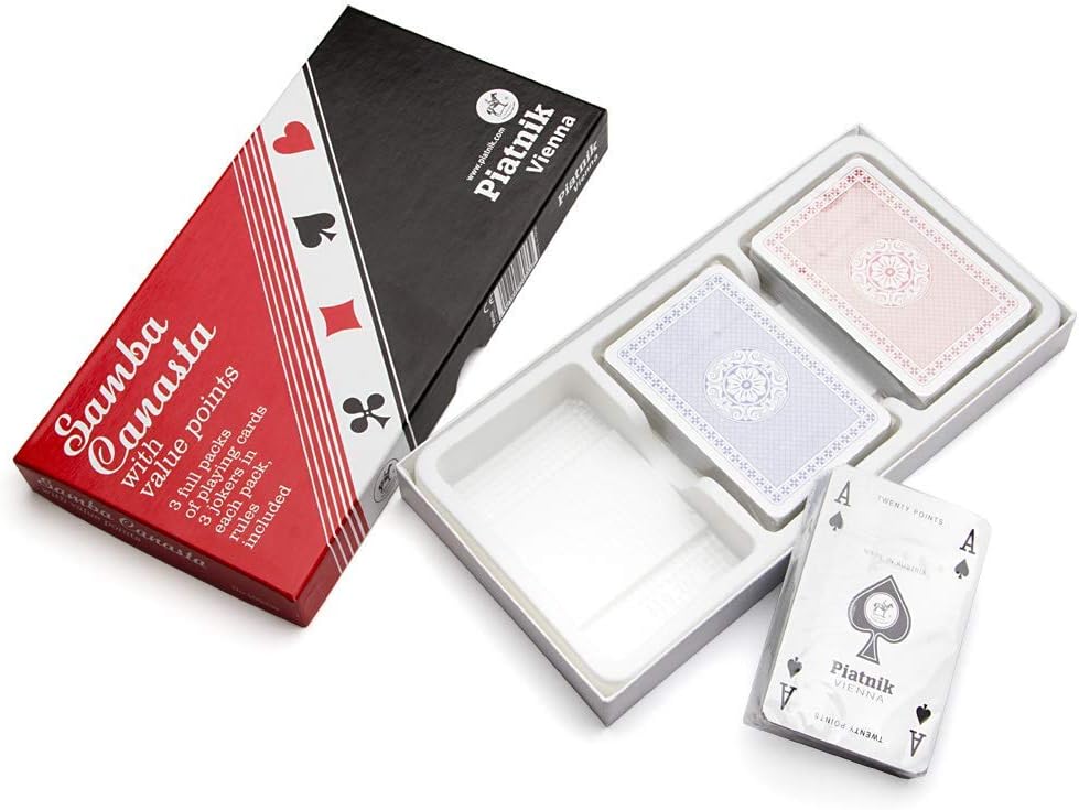 Open Piatnik Samba Canasta set showing two decks in tray and a third deck of value‑point cards.