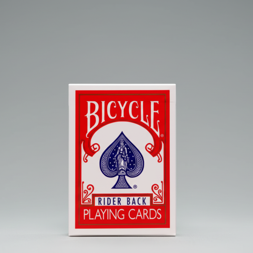 Bicycle playing card deck with red and white design on a gray background