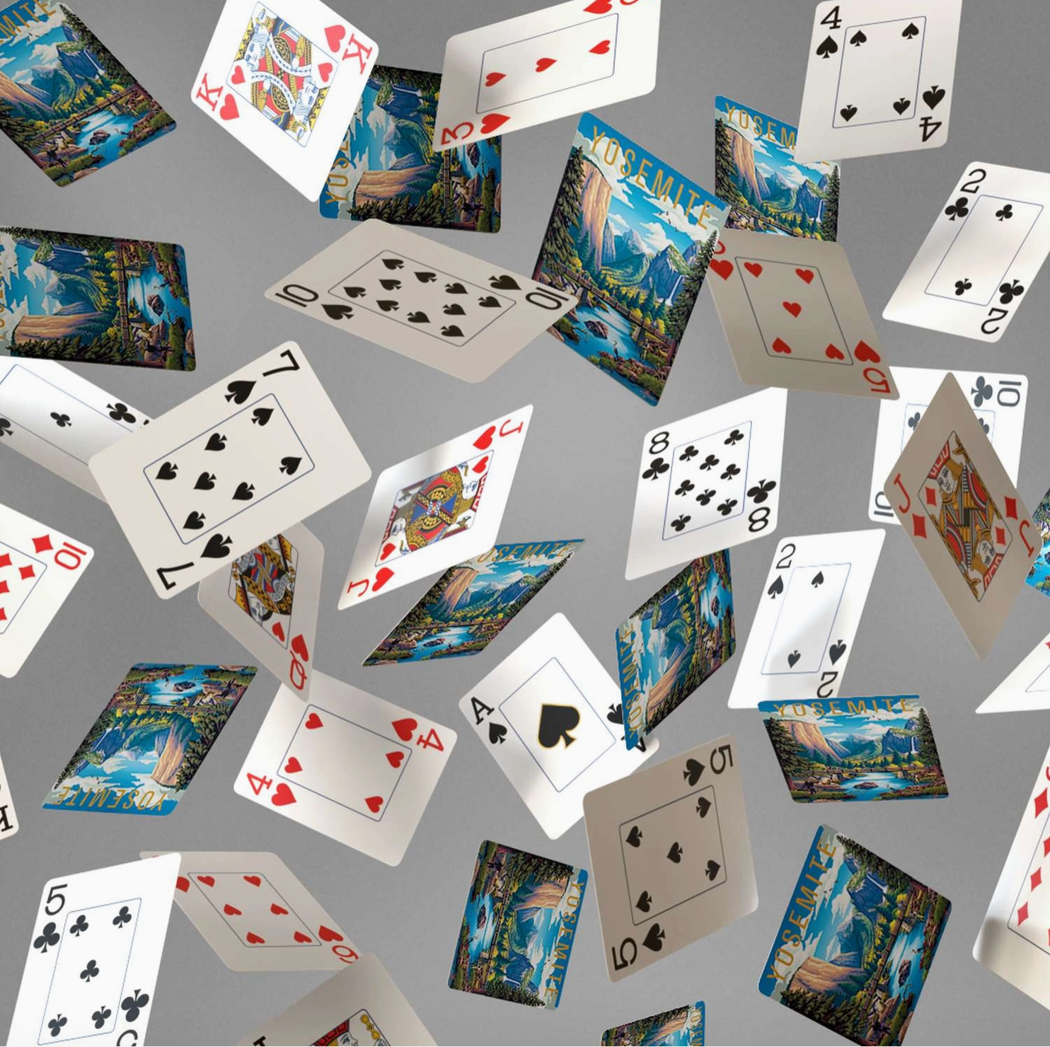 Yosemite National Park scenic playing cards displayed in a cascading spring
