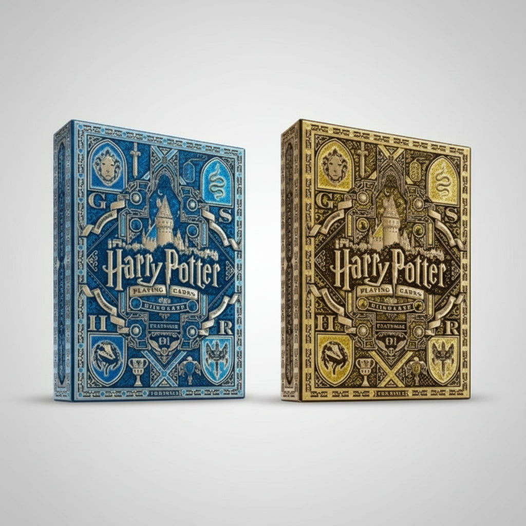 Two Harry Potter-themed playing card boxes, one blue and one gold, on a white background.