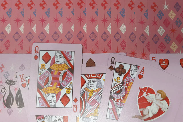 Bicycle Vintage Valentine playing cards with decorative designs on a patterned background