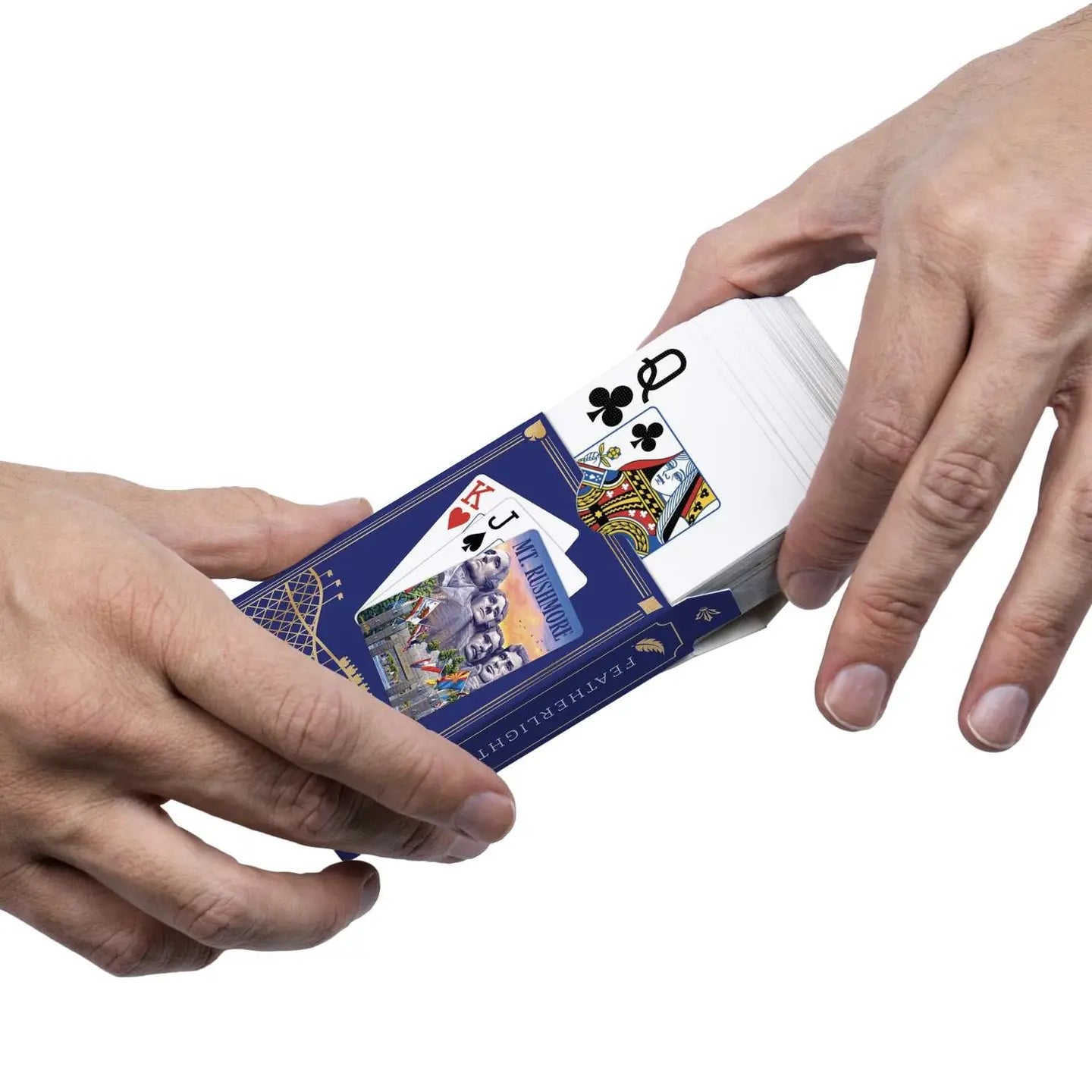 Mount Rushmore playing cards sliding from Boardwalk tuck box