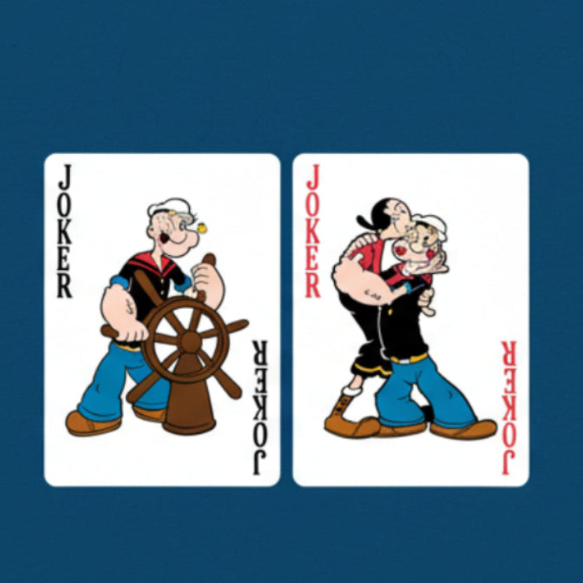 Two playing card jokers with a cartoon character on a blue background