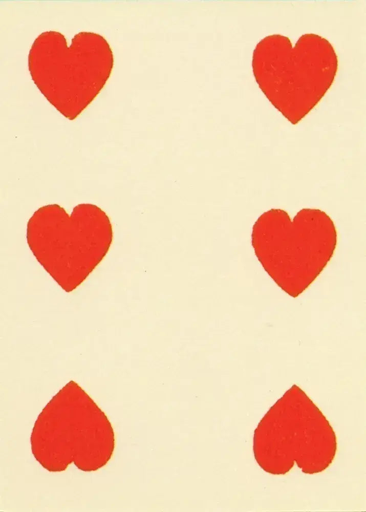 Pattern of red hearts on a beige background